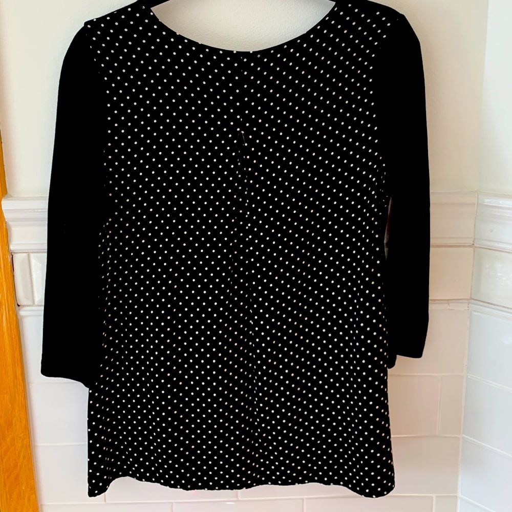 Black top with polka dot back